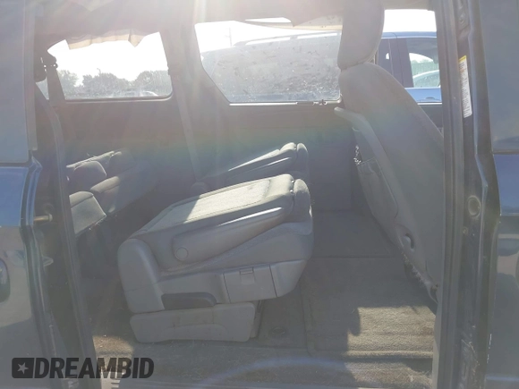 2005 Dodge Caravan SXT with VIN 2D4GP44L65R565519, listed as a IAAI auction lot 42730269 with 124,848 mi miles and . Bid and sale history available at DreamBid. Image 8.