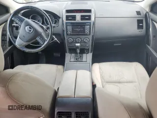 2015 Mazda CX-9 Sport with VIN JM3TB2BA5F0449957, listed as a Copart auction lot 52299825 with 105,017 mi miles and Salvage Title. Bid and sale history available at carsss.com. Image 8.