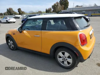 2014 MINI Hardtop with VIN WMWXM5C58ET933445, listed as a Copart auction lot 52769425 with 55,391 mi miles and Salvage Title. Bid and sale history available at DreamBid. Image 2.
