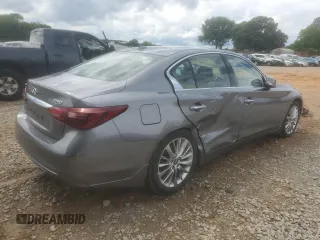 2019 Infiniti Q50 Luxe with VIN JN1EV7AP6KM517944, listed as a Copart auction lot 56942655 with 94,883 mi miles and Salvage title. Bid and sale history available at DreamBid. Image 3.