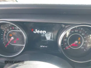 2022 Jeep Gladiator Mojave z VIN 1C6JJTEG0NL103523, wystawiony jako IAAI lot #41842011 z przebiegiem 36 160 mil mil oraz . Historia ofert i sprzedaży dostępna na DreamBid. Obrazek 7.