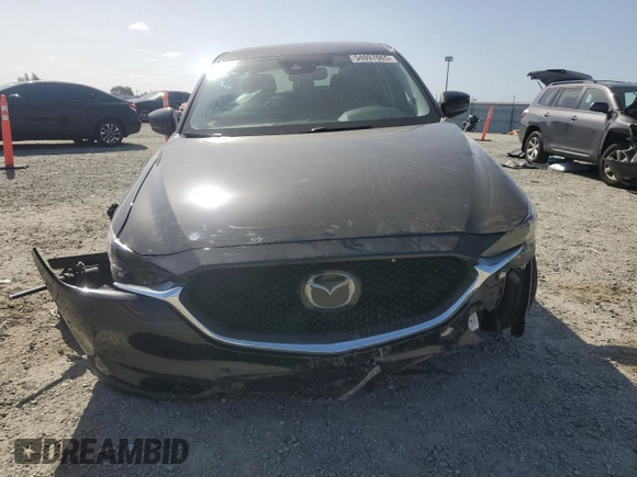 2018 Mazda CX-5 Grand Touring z VIN JM3KFBDM0J0399985, wystawiony jako Copart lot #54097665 z przebiegiem 45 344 mil mil oraz Szkoda całkowita • Salvage title. Historia ofert i sprzedaży dostępna na DreamBid. Obrazek 5.