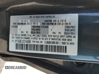 2012 Mazda 5 Sport with VIN JM1CW2BLXC0144268, listed as a Copart auction lot 53838745 with 47,993 mi miles and Salvage Title. Bid and sale history available at DreamBid. Image 13.