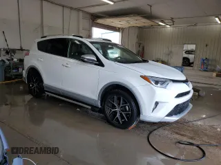 2016 Toyota RAV4 SE with VIN JTMJFREV0GD190302, listed as a Copart auction lot 59330345 with 102,069 mi miles and Salvage title. Bid and sale history available at DreamBid. Image 4.