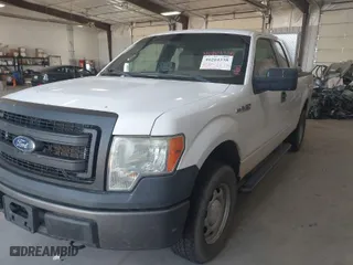 2014 Ford F-150 XL with VIN 1FTFX1EF9EKE41386, listed as a IAAI auction lot 40204338 with 215,536 mi miles. Bid and sale history available at carsss.com. Image 2.
