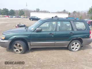 2003 Subaru Forester XS with VIN JF1SG65663H738935, listed as a IAAI auction lot 42119765 with 200,141 mi miles. Bid and sale history available at carsss.com. Image 6.
