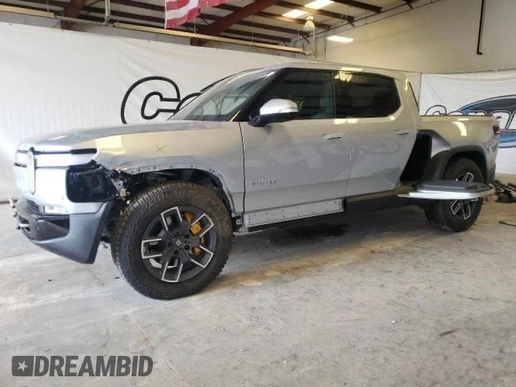 2022 Rivian R1T Launch Edition z VIN 7FCTGAAL7NN006406, wystawiony jako Copart lot #60049275 z przebiegiem 1 517 mil mil oraz Czysty tytuł • Clean title. Historia ofert i sprzedaży dostępna na DreamBid. Obrazek 2.
