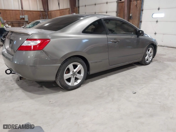 2007 Honda Civic Cpe EX with VIN 2HGFG12897H544860, listed as a IAAI auction lot 42043085 with 120,872 mi miles. Bid and sale history available at carsss.com. Image 4.