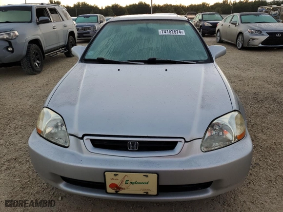 1998 Honda Civic EX with VIN 1HGEJ8148WL016927, listed as a Copart auction lot 74152574 with 130,667 mi miles and Salvage Title. Bid and sale history available at carsss.com. Image 5.