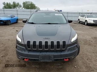 2015 Jeep Cherokee Trailhawk with VIN 1C4PJMBB6FW574108, listed as a Copart auction lot 57798475 with 105,022 mi miles and Salvage title. Bid and sale history available at DreamBid. Image 5.