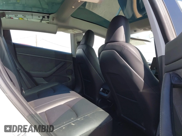 2023 Tesla Model 3 with VIN 5YJ3E1EA9PF640015, listed as a IAAI auction lot 41622086 with 15,622 mi miles and . Bid and sale history available at carsss.com. Image 8.