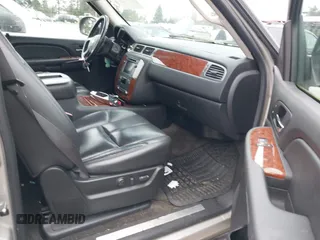 2007 Chevrolet Tahoe LTZ with VIN 1GNFK13047J373205, listed as a IAAI auction lot 41830747 with 182,361 mi miles and . Bid and sale history available at DreamBid. Image 5.