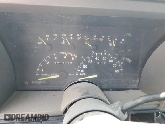 1994 Chevrolet Suburban z VIN 1GNGK26F1RJ444762, wystawiony jako Copart lot #86776674 z przebiegiem 354 375 mil mil oraz Szkoda całkowita • Salvage title. Historia ofert i sprzedaży dostępna na DreamBid. Obrazek 9.