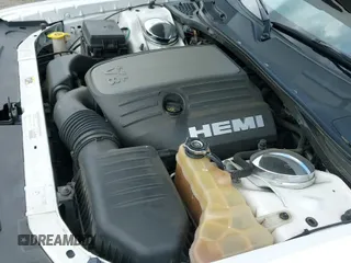 2014 Dodge Challenger R/T z VIN 2C3CDYBT4EH116686, wystawiony jako IAAI lot #42632477 z przebiegiem 119 074 mil mil oraz . Historia ofert i sprzedaży dostępna na DreamBid. Obrazek 19.