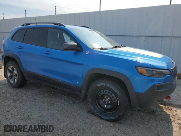 2019 Jeep Cherokee Trailhawk with VIN 1C4PJMBX7KD277477, listed as a Copart auction lot 58969705 with 139,521 mi miles and Salvage title. Bid and sale history available at DreamBid. Image 4.