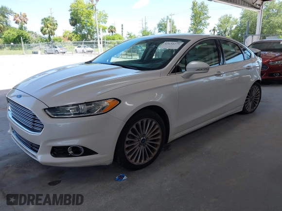 2016 Ford Fusion Titanium with VIN 3FA6P0K96GR390989, listed as a IAAI auction lot 42634275 with 123,559 mi miles and . Bid and sale history available at DreamBid. Image 17.