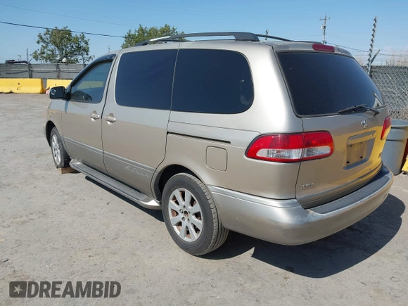 2002 Toyota Sienna LE with VIN 4T3ZF13C72U473555, listed as a IAAI auction lot 42426344 with 330,911 mi miles and . Bid and sale history available at DreamBid. Image 3.