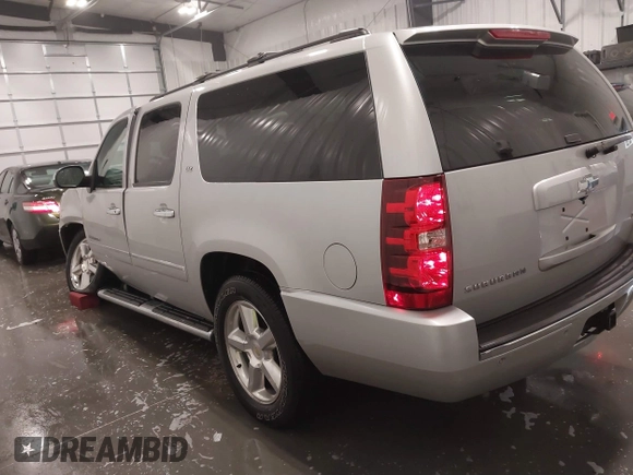 2011 Chevrolet Suburban LTZ with VIN 1GNSKKE31BR143238, listed as a IAAI auction lot 41621927 with 224,313 mi miles and . Bid and sale history available at DreamBid. Image 3.
