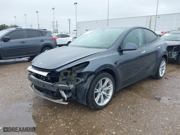 2023 Tesla Model Y Long Range with VIN 7SAYGDEEXPA155581, listed as a IAAI auction lot 41434701 with 15,979 mi miles. Bid and sale history available at carsss.com. Image 23.