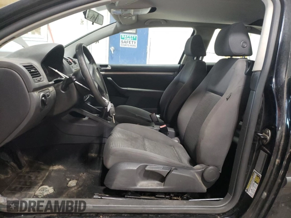 2009 Volkswagen Rabbit S with VIN WVWAA71K69W001495, listed as a Copart auction lot 86813914 with 147,398 mi miles and Salvage title. Bid and sale history available at DreamBid. Image 7.