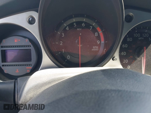 2013 Nissan 370Z z VIN JN1AZ4EH8DM880849, wystawiony jako IAAI lot #42131189 z przebiegiem Nie podano mil oraz . Historia ofert i sprzedaży dostępna na DreamBid. Obrazek 7.