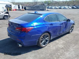 2018 Acura TLX w/A-SPEC Pkg with VIN 19UUB3F65JA006107, listed as a IAAI auction lot 42105820 with 129,268 mi miles and . Bid and sale history available at carsss.com. Image 4.