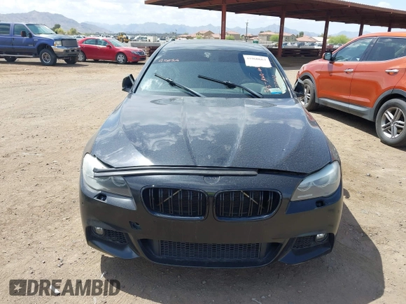 2013 BMW 5 Series 535i xDrive with VIN WBAFU7C51DDU73061, listed as a IAAI auction lot 41960663 with 106,591 mi miles and . Bid and sale history available at carsss.com. Image 12.