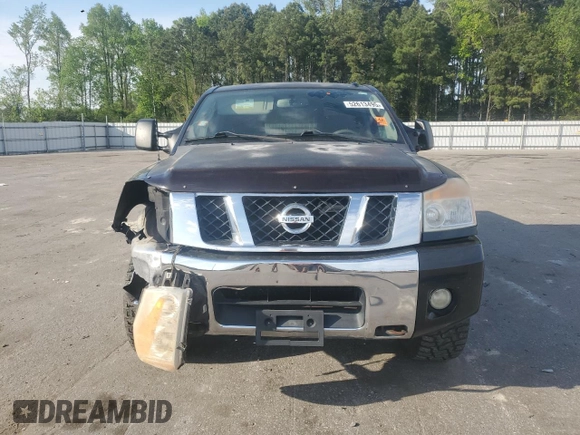 2010 Nissan Titan LE with VIN 1N6BA0EC6AN320790, listed as a Copart auction lot 52613495 with 224,118 mi miles and Salvage Title. Bid and sale history available at carsss.com. Image 5.
