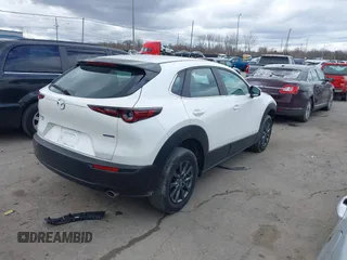 2023 Mazda CX-30 S z VIN 3MVDMBAM6PM572425, wystawiony jako IAAI lot #41833170 z przebiegiem 18 307 mil mil oraz . Historia ofert i sprzedaży dostępna na DreamBid. Obrazek 4.