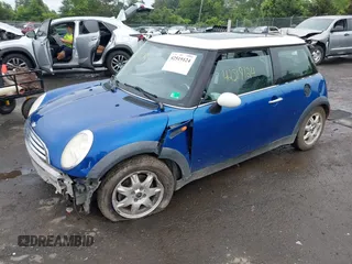 2006 MINI Hardtop with VIN WMWRC33516TK18735, listed as a IAAI auction lot 42519124 with 135,976 mi miles and . Bid and sale history available at DreamBid. Image 2.
