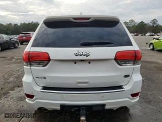 2021 Jeep Grand Cherokee Overland with VIN 1C4RJFCG1MC671472, listed as a Copart auction lot 86326714 with 103,760 mi miles and Salvage Title. Bid and sale history available at carsss.com. Image 6.