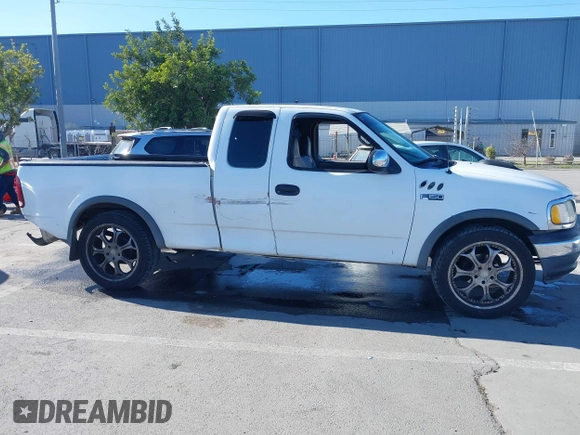 1997 Ford F-150 with VIN 1FTDX1723VKB04987, listed as a IAAI auction lot 41411405 with 234,750 mi miles and . Bid and sale history available at DreamBid. Image 13.