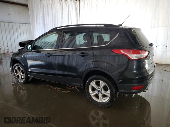 2015 Ford Escape SE with VIN 1FMCU9G99FUB64824, listed as a Copart auction lot 54930305 with 143,388 mi miles and Clean Title. Bid and sale history available at DreamBid. Image 2.