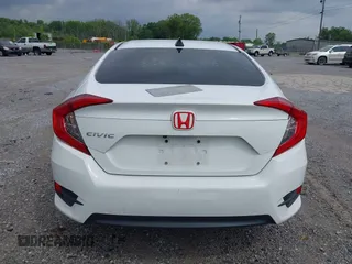 2018 Honda Civic LX with VIN 2HGFC2F59JH576975, listed as a IAAI auction lot 42098020 with 89,791 mi miles and . Bid and sale history available at DreamBid. Image 17.