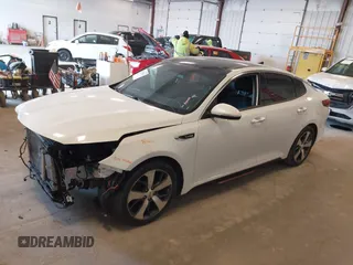 2018 Kia Optima SX with VIN 5XXGW4L27JG237960, listed as a IAAI auction lot 41956461 with 87,085 mi miles and . Bid and sale history available at DreamBid. Image 2.