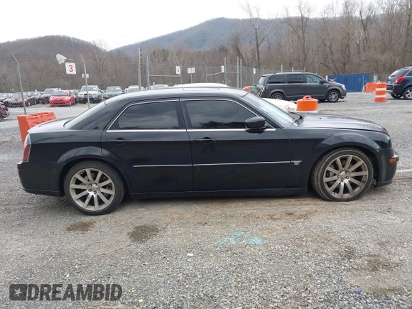 2006 Chrysler 300 C SRT8 with VIN 2C3KA73W06H239927, listed as a IAAI auction lot 41837066 with 169,260 mi miles. Bid and sale history available at carsss.com. Image 13.