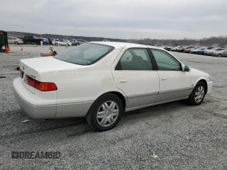 2001 Toyota Camry CE z VIN JT2BG22K210600687, wystawiony jako Copart lot #48807225 z przebiegiem 307 479 mil mil oraz Szkoda całkowita • Salvage title. Historia ofert i sprzedaży dostępna na DreamBid. Obrazek 3.