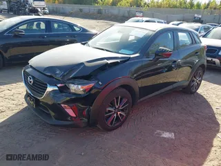 2018 Mazda CX-3 Touring with VIN JM1DKFC75J1302046, listed as a IAAI auction lot 40570799 with 62,554 mi miles. Bid and sale history available at carsss.com. Image 17.