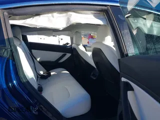2019 Tesla Model 3 Long Range with VIN 5YJ3E1EB7KF454636, listed as a IAAI auction lot 41853972 with 56,916 mi miles. Bid and sale history available at carsss.com. Image 8.
