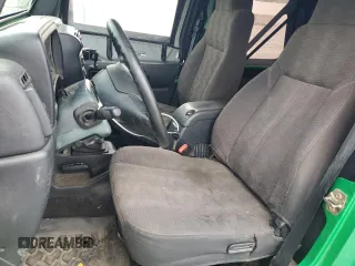2004 Jeep Wrangler SE with VIN 1J4FA29124P769475, listed as a Copart auction lot 64371244 with 136,877 mi miles and Salvage title. Bid and sale history available at DreamBid. Image 7.