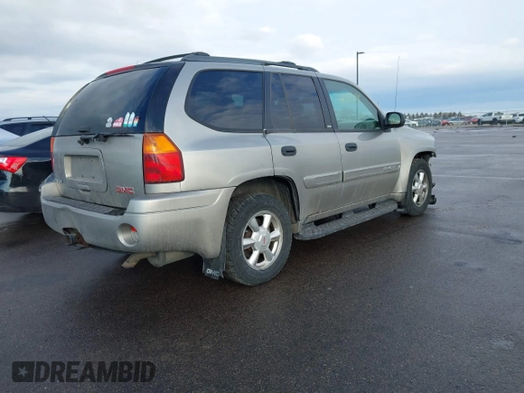 2003 GMC Envoy SLT with VIN 1GKDT13S532308502, listed as a IAAI auction lot 41676188 with 218,626 mi miles. Bid and sale history available at carsss.com. Image 4.