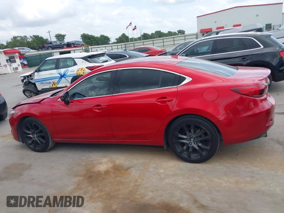 2016 Mazda 6 i Grand Touring z VIN JM1GJ1W58G1486694, wystawiony jako IAAI lot #42094443 z przebiegiem 77 803 mil mil oraz . Historia ofert i sprzedaży dostępna na DreamBid. Obrazek 14.
