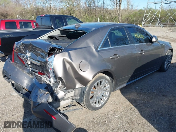 2012 Cadillac CTS Premium with VIN 1G6DS5E3XC0128264, listed as a IAAI auction lot 41964295 with 117,889 mi miles and . Bid and sale history available at DreamBid. Image 4.