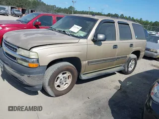 2005 Chevrolet Tahoe LS with VIN 1GNEC13V65J249079, listed as a IAAI auction lot 42127866 with 243,705 mi miles. Bid and sale history available at carsss.com. Image 2.