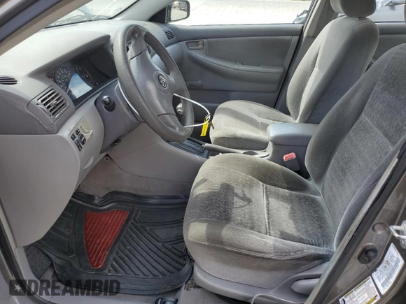 2004 Toyota Corolla CE with VIN 1NXBR32E24Z304630, listed as a Copart auction lot 56043555 with 159,342 mi miles and Salvage Title. Bid and sale history available at DreamBid. Image 7.