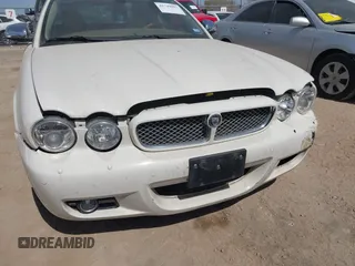 2008 Jaguar XJ Vanden Plas with VIN SAJWA82BX8SH28725, listed as a IAAI auction lot 41749097 with 64,440 mi miles. Bid and sale history available at carsss.com. Image 6.