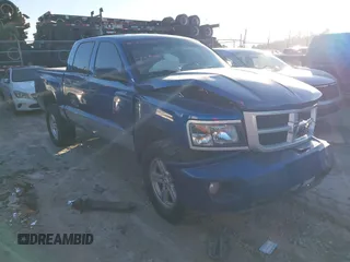 2010 Dodge Dakota Bighorn/Lonestar with VIN 1D7CW3GP5AS130870, listed as a IAAI auction lot 40929651 with 128,077 mi miles. Bid and sale history available at carsss.com. Image 1.