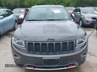 2014 Jeep Grand Cherokee Limited with VIN 1C4RJFBG4EC227165, listed as a IAAI auction lot 42135232 with 105,873 mi miles. Bid and sale history available at carsss.com. Image 6.