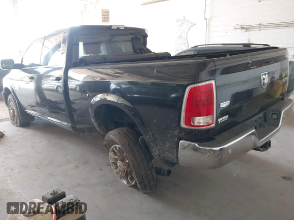 2017 Ram 2500 Laramie with VIN 3C6UR5FL8HG671078, listed as a IAAI auction lot 42233014 with 295,572 mi miles and . Bid and sale history available at DreamBid. Image 3.
