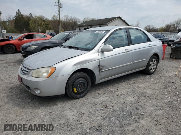 2004 Kia Spectra LX with VIN KNAFE121245031019, listed as a Copart auction lot 52960135 with 183,016 mi miles and Salvage Title. Bid and sale history available at carsss.com. Image 1.